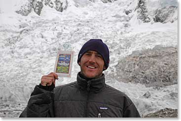 Danny stands at the Khumbu Icefall with a Card Lama Geshi  gave him