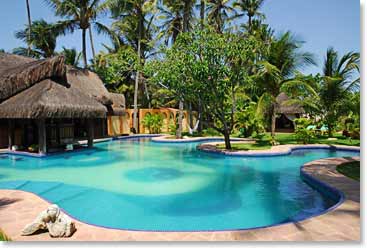 Relaxing by the pool at one of our hotels on the beach