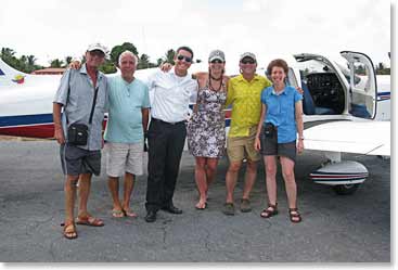 The group gets prepared to take a small plane on an aerial view of Lancois