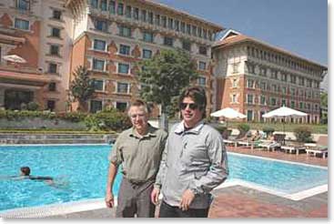 Leland and Michael stroll around the pool and their hotel, the Park Hyatt