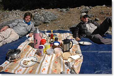 After a morning of trekking, Leland and Michael enjoy their lunch in the warm sunshine