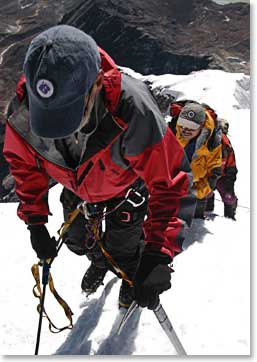 Climbers and BAI guide Ang Temba take their final steps to Lobuche summit