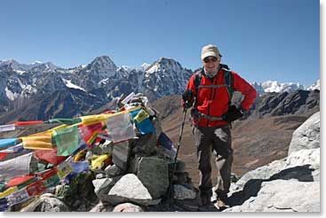 Prayer flags mark the way as Leland reaches Lobuche Base Camp