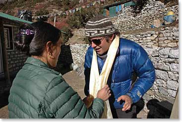 Yanzing presents Michael with a Khata blessing scarf as he leave Pangboche