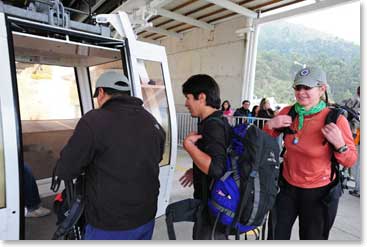 BAI guides Oswaldo and Juancho join Leila on the telephrique just above Quito for the ride to higher elevations