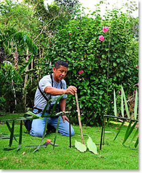 Sixto explains how one of his animals traps work