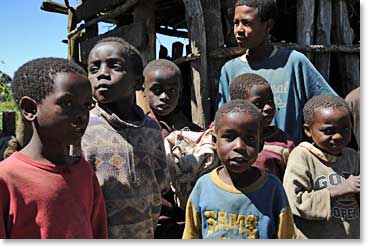 Local children come to greet our team with curiosity and smiles