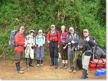 Team poses for a photo as they begin their climb