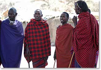 A group of Maasai men gather around