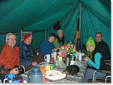 The team enjoys a fabulous meal on the mountain