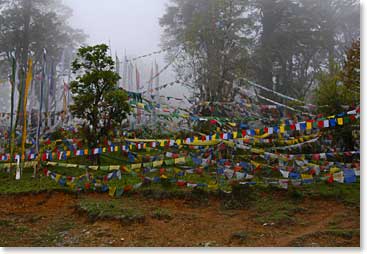 Prayer flags adorn the mountain trail surrounding Paro. They are made from colorful cloth and are used as blessings