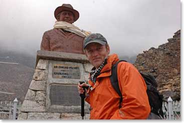 Edouard stands at the bust of Hillary at the school in Khumjung