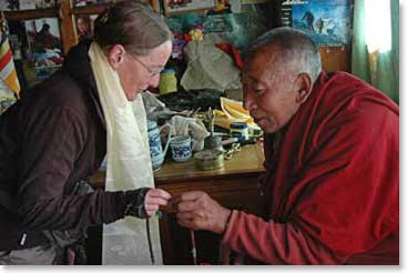 Yesterday morning before we left Pangboche, Kit received her blessing from Lama Geshi