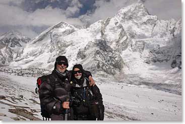 Bob and Kit at the point on Kala Pattar where Kit turned back, with Everest if visible in the clouds behind