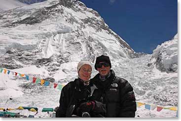 Kit and Bob at Everest Base Camp, with the famous Khumbu Icefall behind