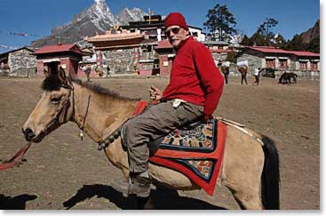 After weeks of difficult  trekking in Bhutan and Nepal, Jim decided to ride a pony down the valley