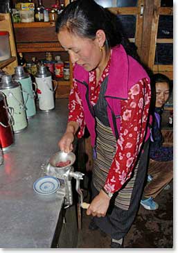 Yangzing prepares dinner for the team at her lodge