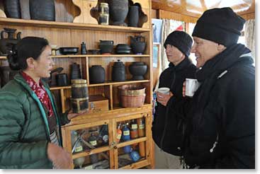 We went all the way to Pangboche on May 10th and we were all very eager to return to Yangzing and Temba’s lodge. Here Yangzing is showing Lida and Calli-Ann her collection of traditional Sherpa housewares.