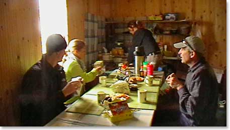 Back in a warm dining room Irina serves Vladimir, Richard and Nicky