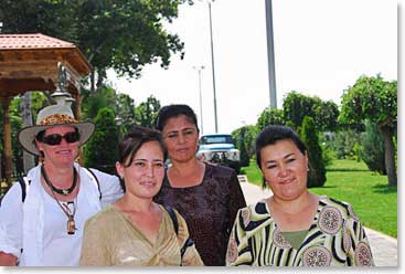 There are not many tourists in Tashkent.  We found friendly locals taking pictures of us out of interest.  Annette with new friends.