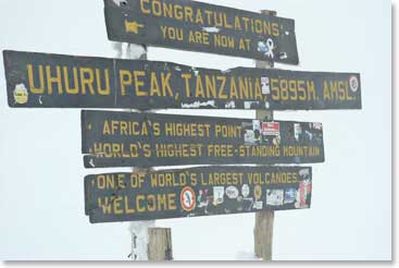 Congratulations! Chris reached the famous sign, on the “Rooftop of Africa”.