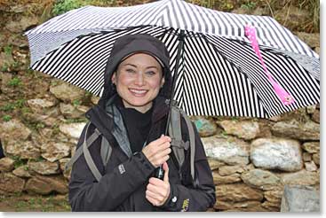 It has been observed that we are a color-coordinated group.  When it began to rain, Lori got out her umbrella