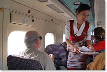 Yes, there are flight attendants on the flight to Lukla!