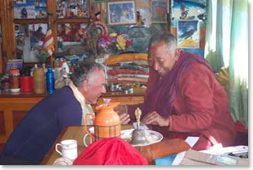 Eric getting his blessing from Lama Geshi