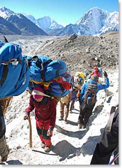 Porters along the trail to Lobouche and Gorak Shep