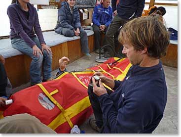 Todd checking the altimeter for Paul to use inside the Gamow bag