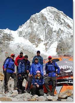 The trekking team at Pumori Base Camp, with Pumori behind