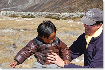 While we waited, Aenea enjoyed play time with a local Sherpa boy