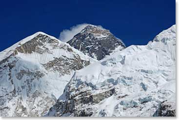 We noticed a change in the sky overhead. The summit of Everest is showing clouds forming on the north side of the mountain and there have been signs of strong winds above us at the highest elevations.
