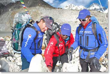Before Jamie, Todd and Scott go up the mountain to climb, they spend time at the Base Camp Chorten just as the Sherpas do. Here they are preparing the sacred juniper to burn as an offering for peace and good fortune.
