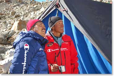 From here at Base Camp Ang Temba, Kami and the other team members watch their progress on the mountain above.