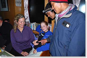 Leila checking the oxygen saturation of our trekking guides