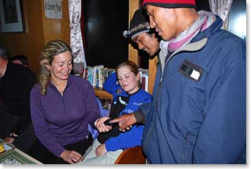 Leila checking the oxygen saturation of our trekking guides 