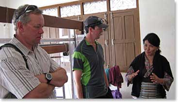 Mike and Aenea learning from Tshering about handmade carpets