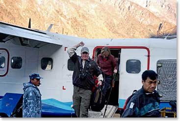 The plane has landed on the famous Lukla airstrip and George W is the first one out