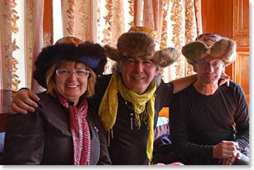 Linda, George and Reginald in their hats from the market