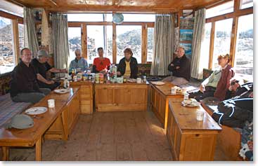 The team has lunch before leaving for the trail