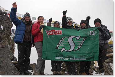 The true fans with their flag on the top of Gokyo Ri!