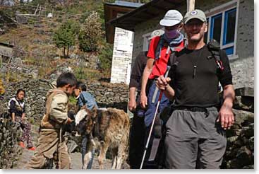 Local children and a baby yak