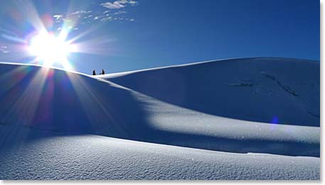 High near the summit of Cotopaxi as the sun is rising.