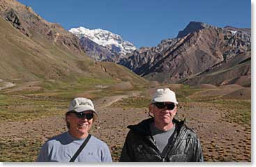 Kelly and Don pose with the South Face of Aconcagua