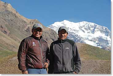 Oswaldo and Nelson pose in front of the South Face of Aconcagua