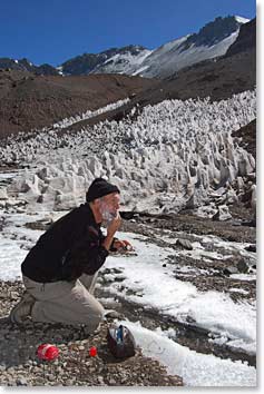 David tries shaving in the freezing cold water at Penitentes