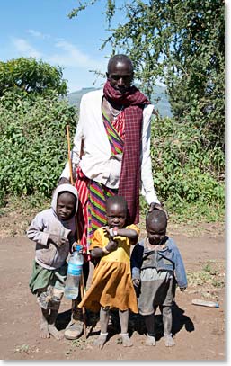 Hadzabe man with his children