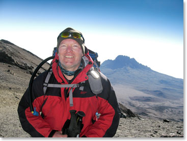 Dave beams from ear to ear after summiting Uhuru Point.