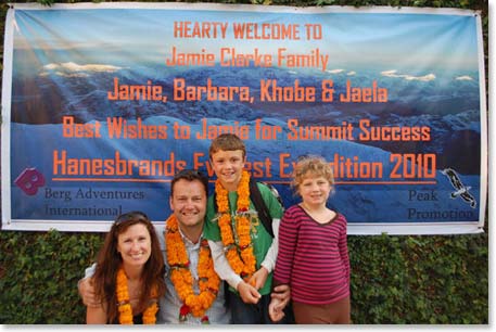 The Clarke family poses with their own Berg Adventures welcome sign.